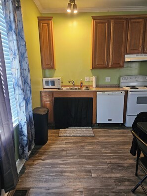 Private kitchen - Cozy 2-bedroom townhome in charming New Orleans with AC, WiFi, and yard. (New Orleans)