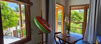 Estúdio Aconchegante abraçado por grandes cajueiros à menos de 200m da praia