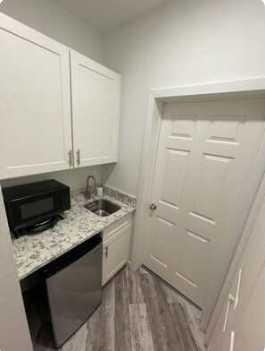 Fridge, microwave, coffee/tea maker, toaster
