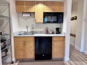 Fridge, microwave, coffee/tea maker, toaster