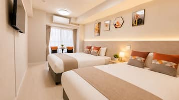Comfort Quadruple Room | Premium bedding, desk, laptop workspace, blackout drapes