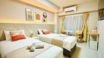 Classic-værelse med 2 enkeltsenge | Premium-sengetøj, skrivebord, arbejdsområde til bærbare computere