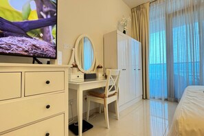 1 bedroom, desk, iron/ironing board, travel cot