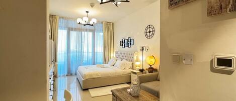 1 bedroom, desk, iron/ironing board, travel crib