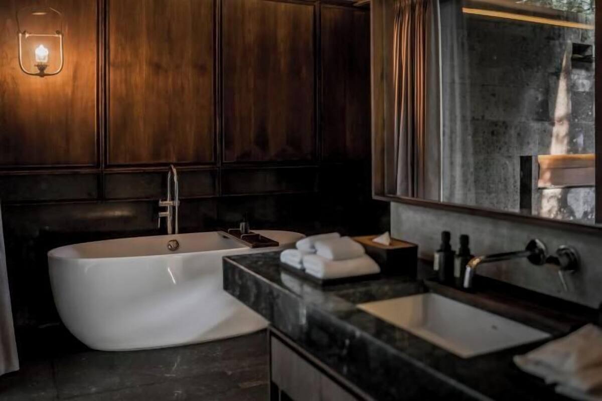 Bathroom | Hair dryer, bathrobes, slippers, towels