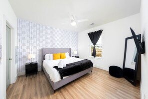 1 bedroom, desk, iron/ironing board, travel cot