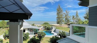 Spacious 5-bedroom beachfront in charming Kui Buri with AC, WiFi, pool. 3 villas