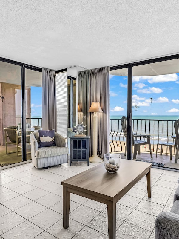 Family Condo, 3 Bedrooms, Balcony, Beach View | Living room | 50-inch Smart TV with digital channels
