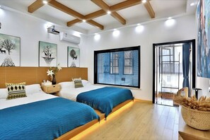 Comfort Quadruple Room | Individually decorated, individually furnished, blackout drapes - Shanghai Monegative Time Garden Hotel (Shanghai)