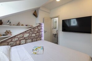 2 chambres, fer et planche à repasser, draps fournis