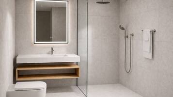 Family Room w/ French Balcony | Bathroom | Shower, hair dryer, towels, soap
