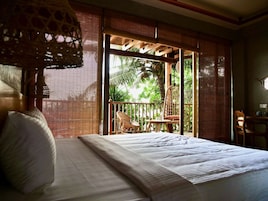 Deluxe Double Room, Balcony, Ground Floor | In-room safe, desk, free WiFi