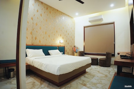 Quarto. The Krati Resort