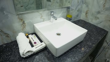 Suite | Bathroom | Shower, slippers, towels
