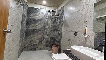 Shower, free toiletries, towels, soap