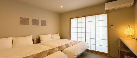 2 bedrooms, desk, laptop workspace, iron/ironing board