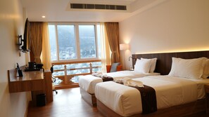 Deluxe Twin Room, 2 Twin Beds, Balcony, City View | Premium bedding, memory foam beds, minibar, individually decorated - Tro Hotel (Thimphu)