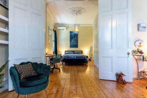 1 bedroom, desk, iron/ironing board, travel crib