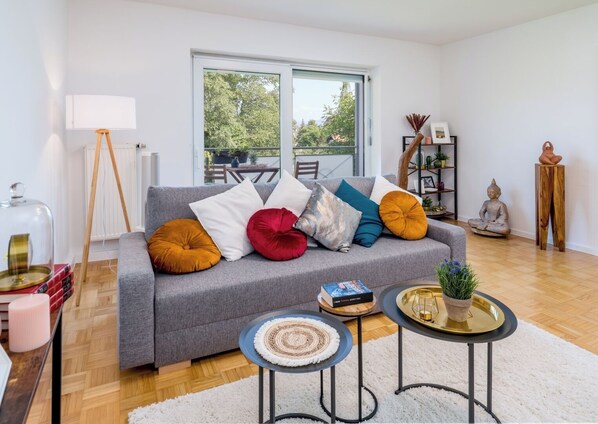 Deluxe Condo, Balcony | Living area