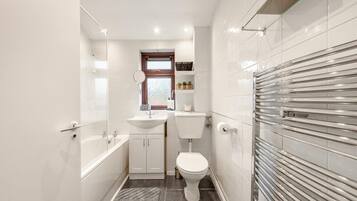 Hair dryer, towels, soap, toilet paper