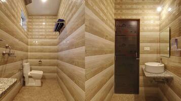 Shower, towels, soap, toilet paper