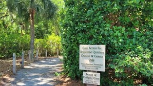 A gate sign for Brigantine Quarters with a Beach & Coligny Gate sign below it. - Shipyard Resort - Brigantine Quarters (Hilton Head Island)