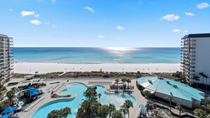 A resort with a large pool, beach view, and multiple buildings. - Edgewater Beach Front T3 Sleeps 4 book with us now! (Panama City Beach)