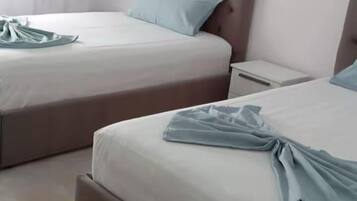 2 habitaciones, tabla de planchar con plancha, wifi y ropa de cama