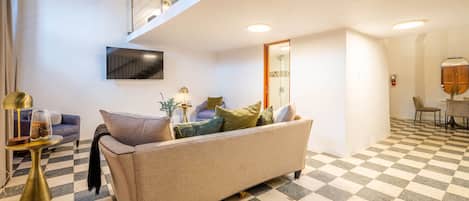 Loft, 1 Bedroom, Balcony | Living area | 45-inch LED TV with digital channels
