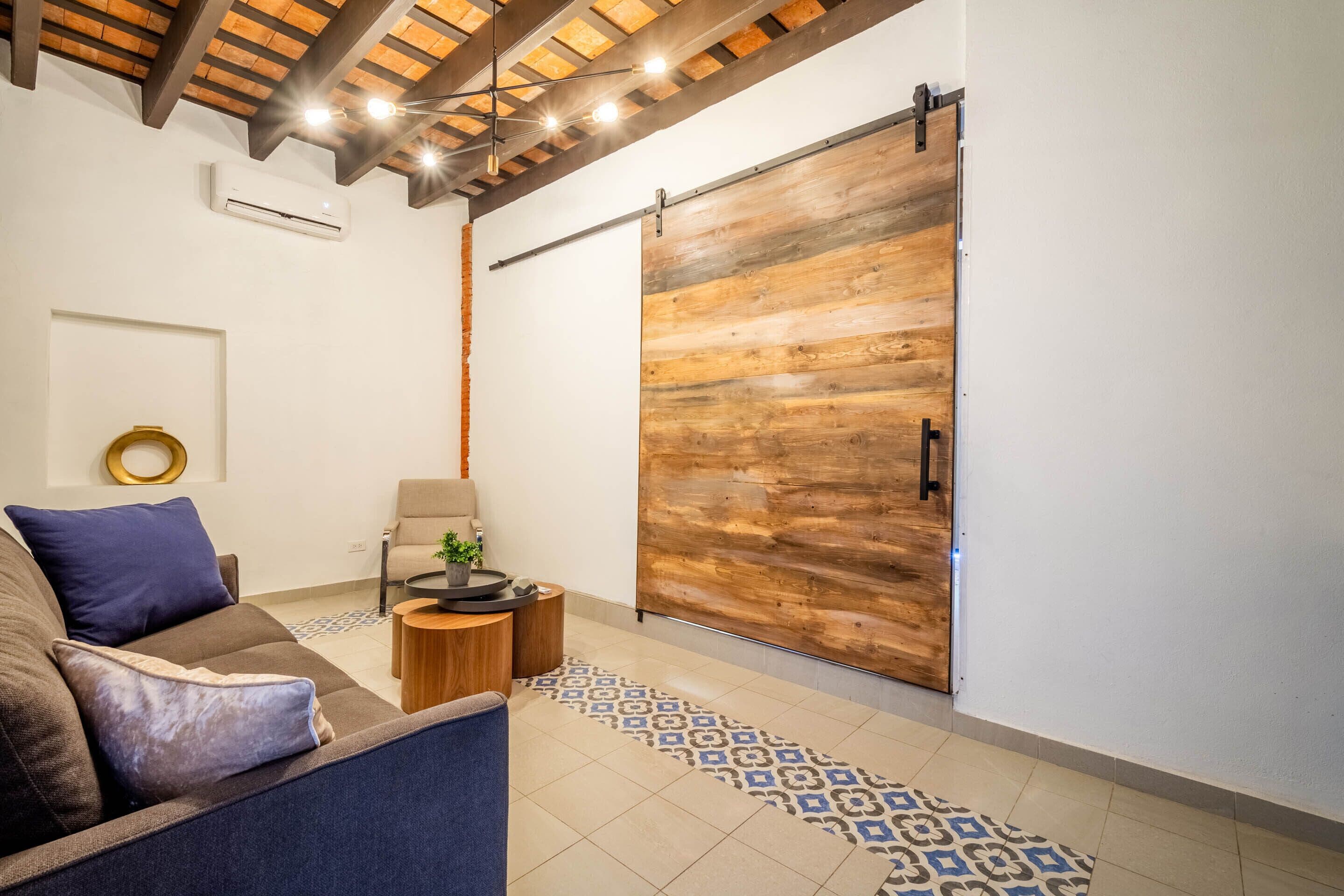 Apartment, 1 Bedroom, Balcony | Living area | 45-inch LED TV with digital channels
