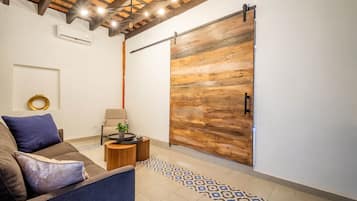 Apartment, 1 Bedroom, Balcony | Living area | 45-inch LED TV with digital channels