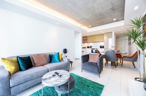 Appartement Supérieur, vue ville | Coin séjour