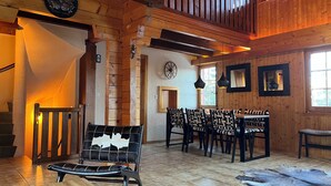 A wooden interior with a dining area, a fireplace, and a staircase. - Authentic chalet for 6 pers - A charming place 5 min from Nendaz station  (Nendaz)