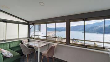 Quarto romântico, vista para o mar | Terraço/pátio