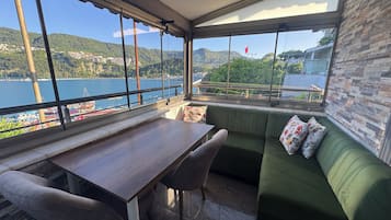 Deluxe Quadruple Room, 2 Bedrooms, Sea View | Terrace/patio
