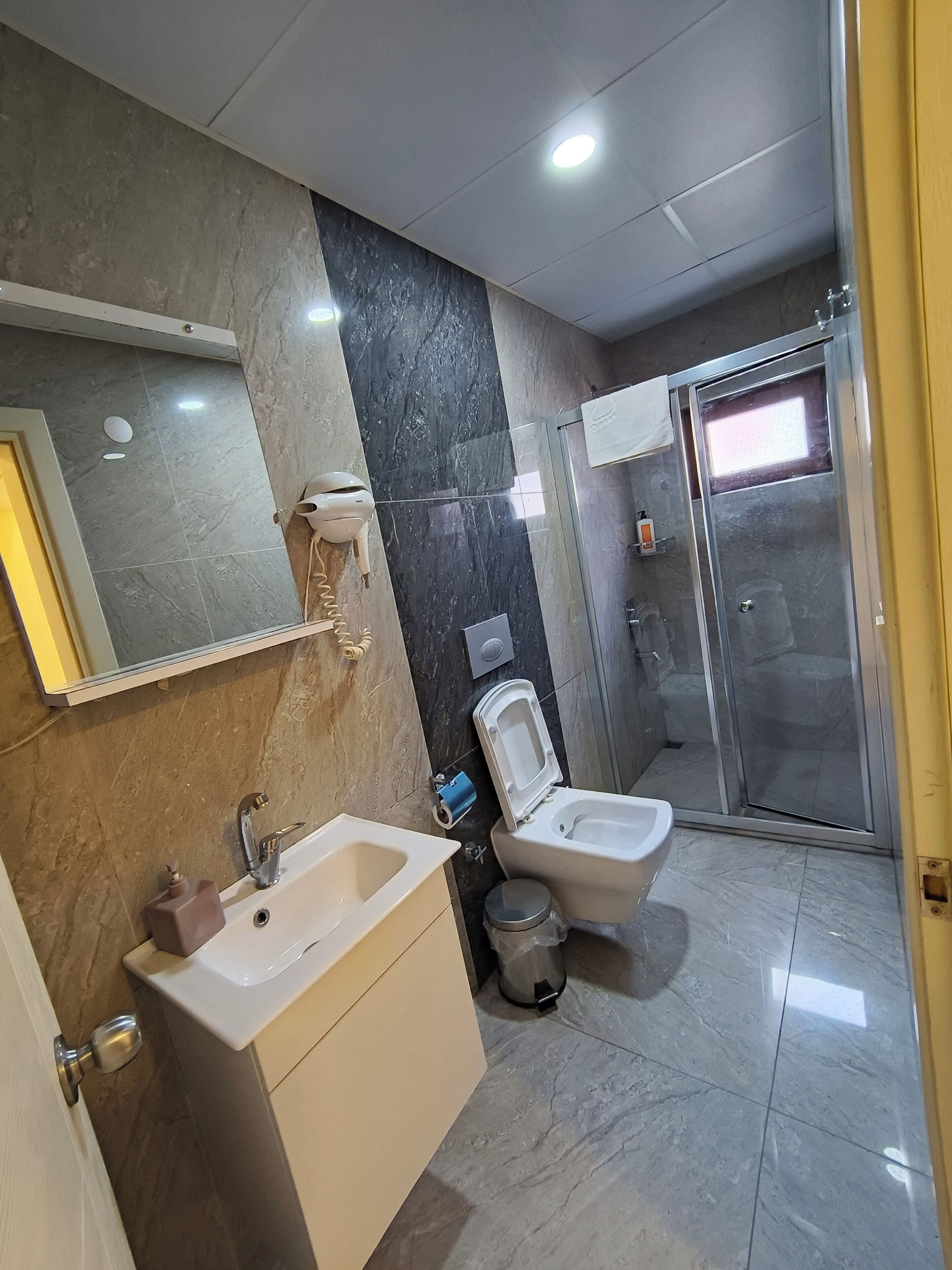 Deluxe Quadruple Room, 2 Bedrooms, Sea View | Bathroom | Shower, hair dryer, slippers, towels