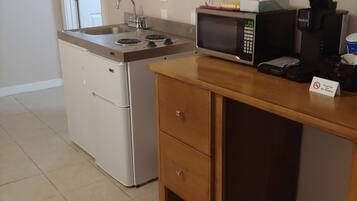 Fridge, microwave, stovetop, coffee/tea maker