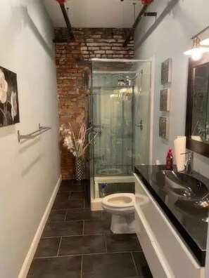 Hair dryer, towels, soap, shampoo