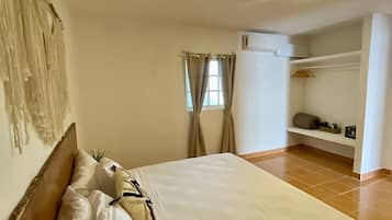 Family Apartment | 1 bedroom, in-room safe, blackout curtains, iron/ironing board