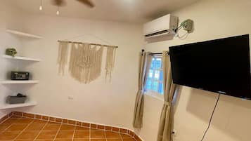 Comfort Apartment, 1 Queen Bed, Patio, Ground Floor | 1 bedroom, in-room safe, blackout curtains, iron/ironing board