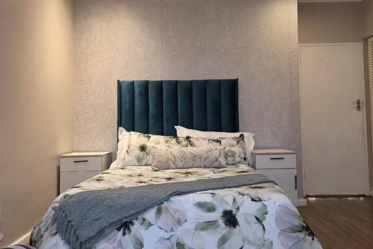 Luxury Double Room, Pool View | Laptop workspace, iron/ironing board, free WiFi