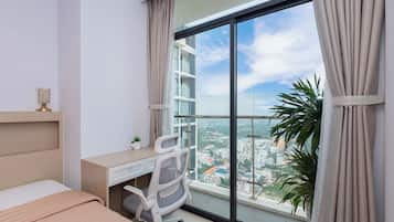 Deluxe Apartment, Partial Sea View | 1 bedroom, premium bedding, memory-foam beds, minibar