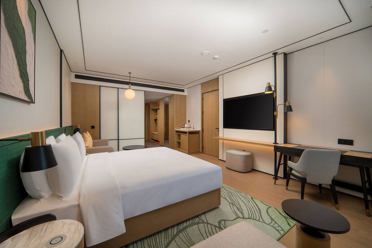 Premium bedding, down duvets, memory-foam beds, minibar