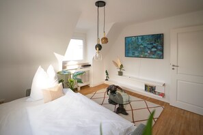 1 chambre, fer et planche à repasser, Wi-Fi, literie fournie