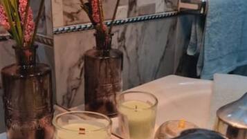 Shower, towels, toilet paper