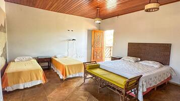 Neljän hengen standard-huone, lanai, näköala puutarhaan | Ilmainen Wi-Fi