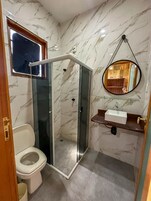 Standard Double or Twin Room, Lanai, Garden View | Bathroom | Shower, towels, soap, shampoo