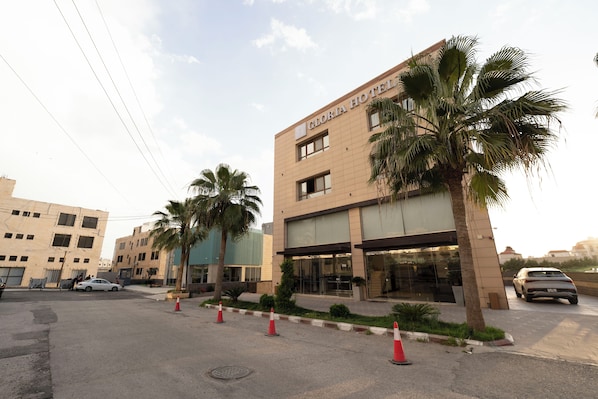 A hotel building with a sign reading "GLORIA HOTEL". - Gloria Boutique Hotel (Amman)
