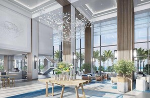 A spacious lobby with a pool, large windows, and modern furnishings. - Vida Beach Resort Marassi Al Bahrain (Manama)