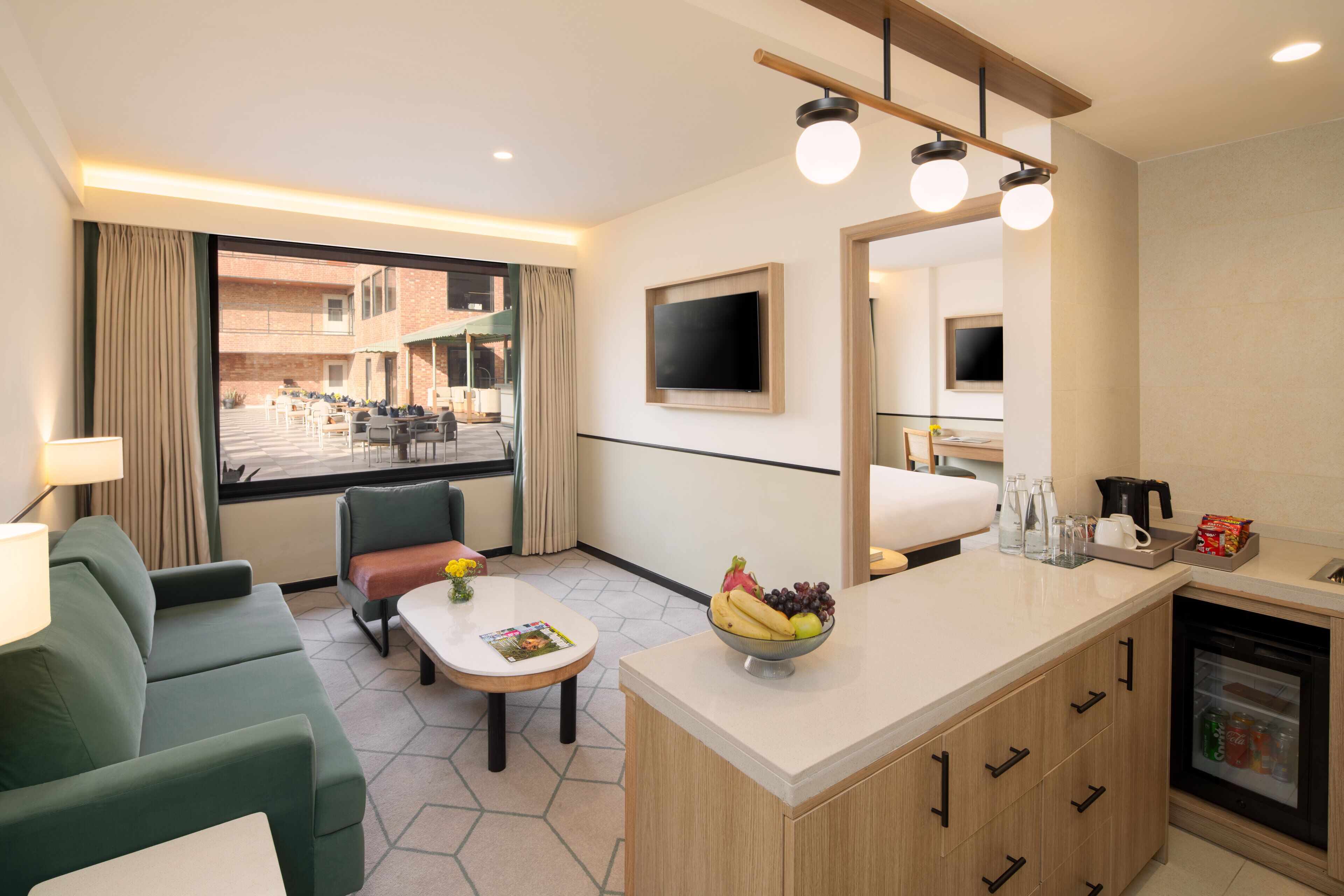 Suite, 1 Bedroom, Pool View | Down duvets, minibar, in-room safe, individually decorated
